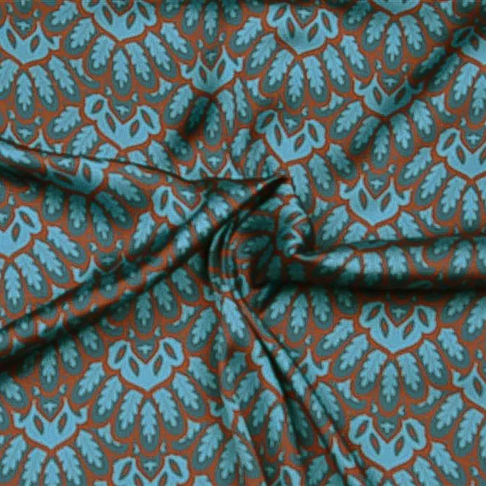 Polyester satijn turquoise met retromotief met bruine omlijning